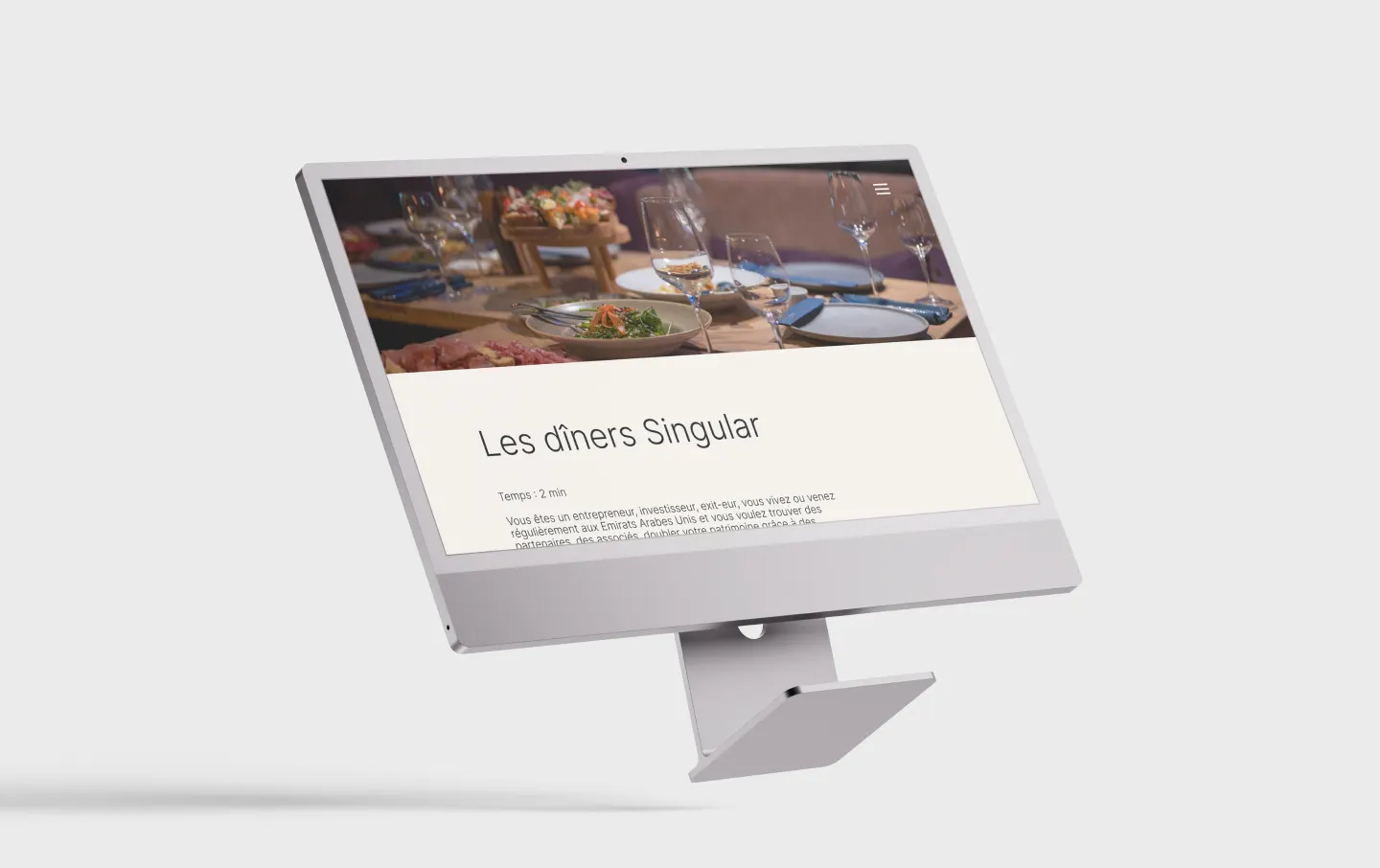 The “Singular dinners” page of the Singular Club website on an iMac